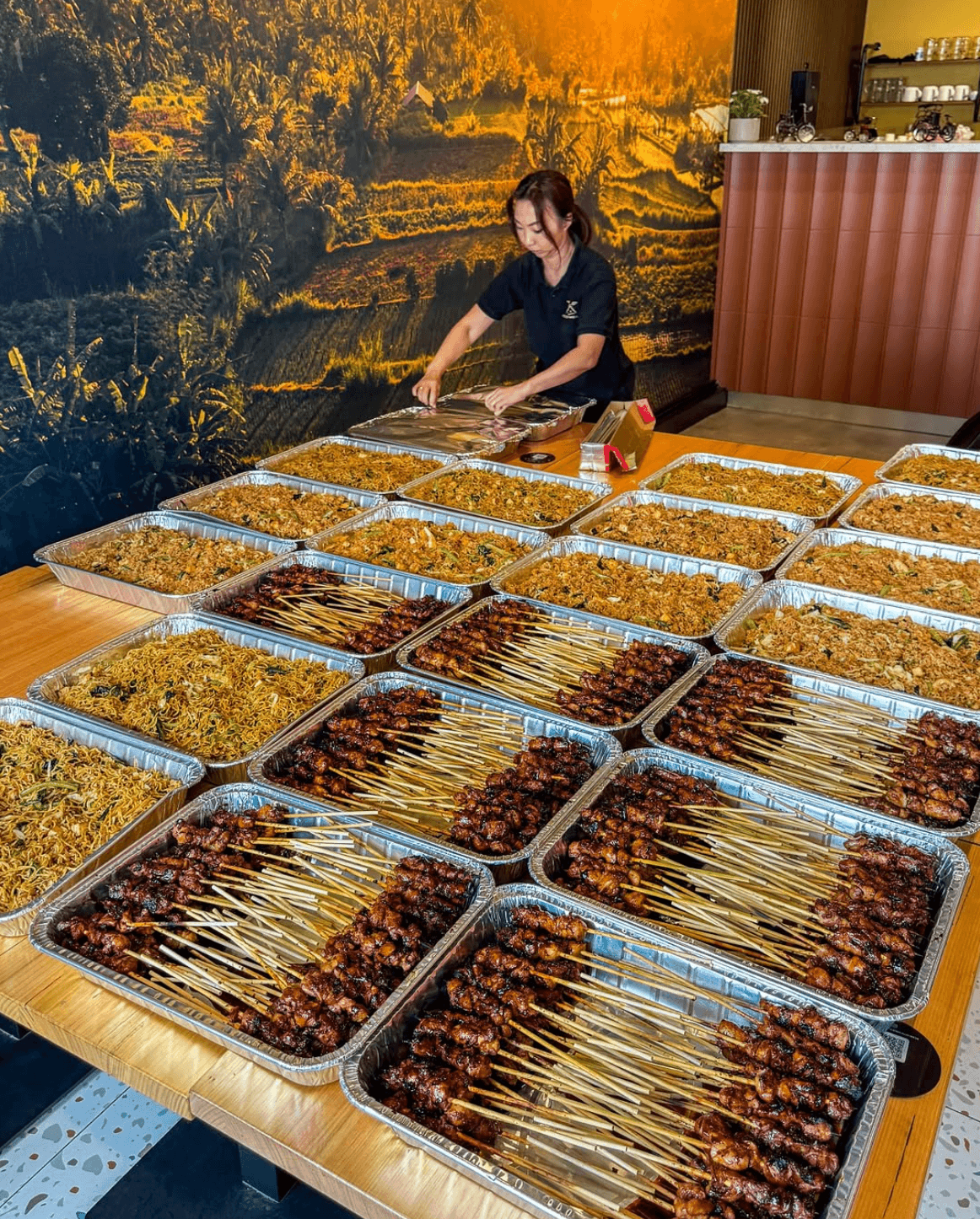 Transform Your Events - Indonesian catering setup with skewers
